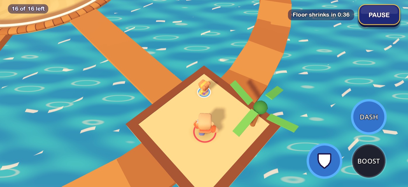Two players on a sandy platform above open water during a sixteen-player match, with 16 of 16 left and the Dash, Shield and Boost buttons on screen.